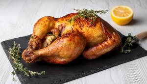 Roast chicken with lemon, thyme and garlic